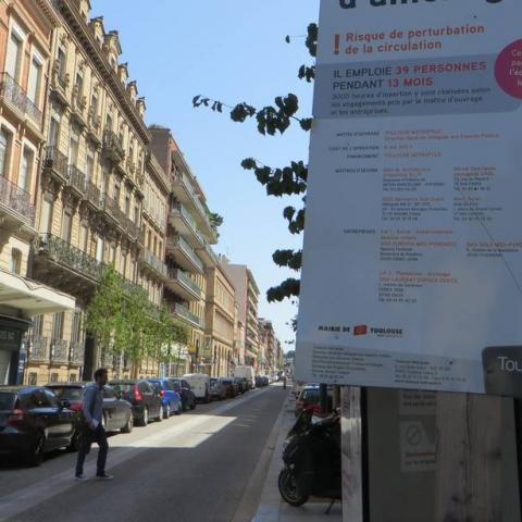 A street with a sign posted