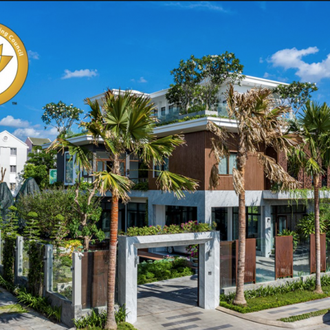 Front of the villa including the publicly accessible green walkway