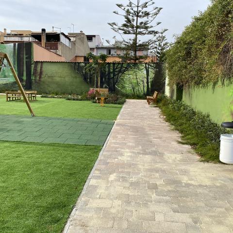 Photo of the playground area and of the rest of the amenties implemented within the project.