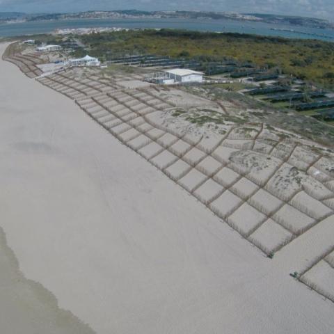 The image shows the results of the coastal protection intervention.